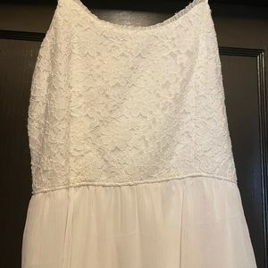 Lace top,full slip with sheer overlay.Shirred back. Adjustable straps